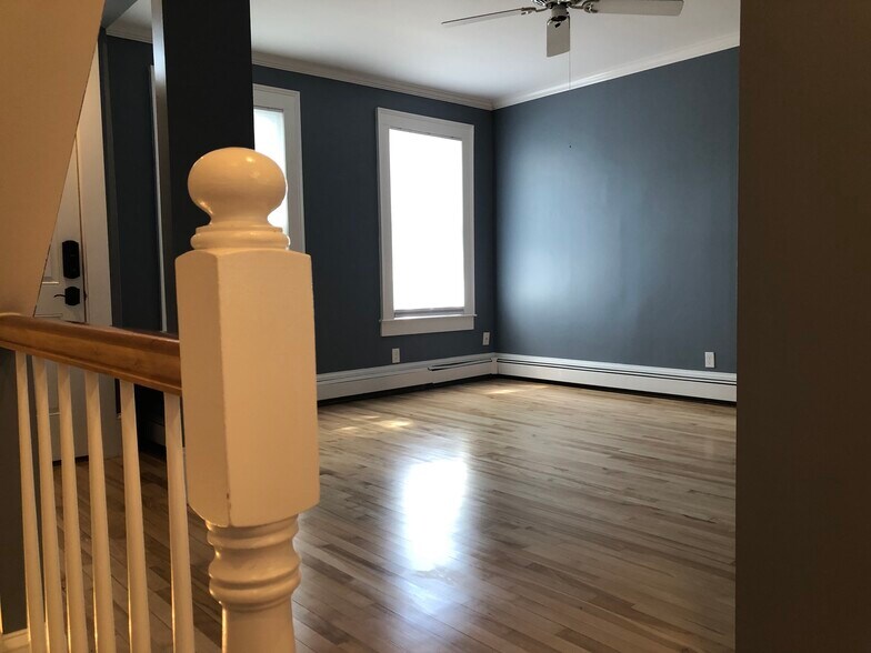 View from Stairs to Living Room - 231 Broadway