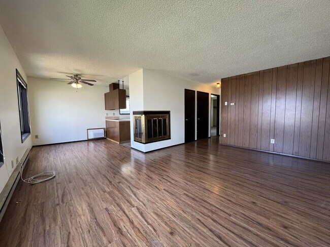 Building Photo - Spacious 3 Bedroom with Bonus Living Area, Patio & Built in Fireplace