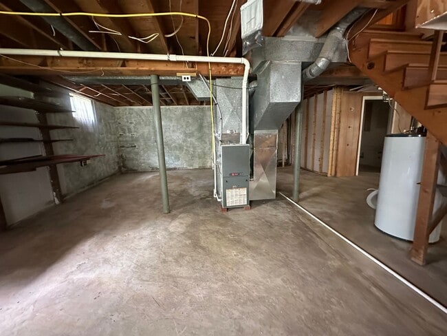 Building Photo - Spacious brick house with a caport and unf...