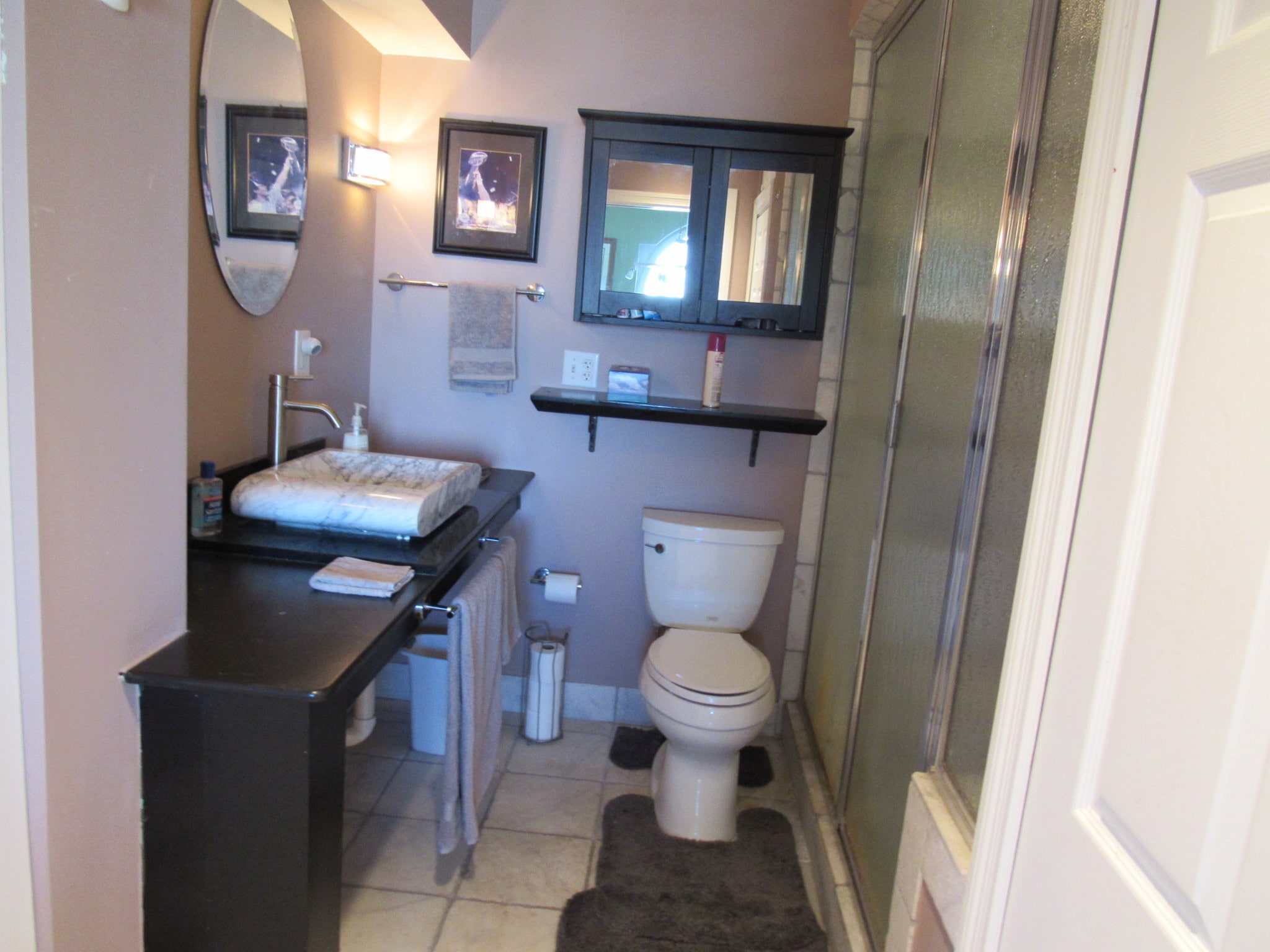 Bathroom with marble vessel sink - 100 Marina Dr