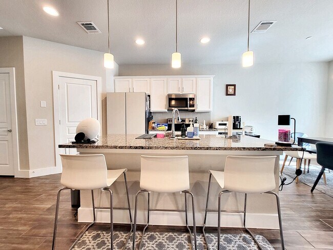 Building Photo - Modern 3/BR 2.5/Bath Home with Covered Dec...