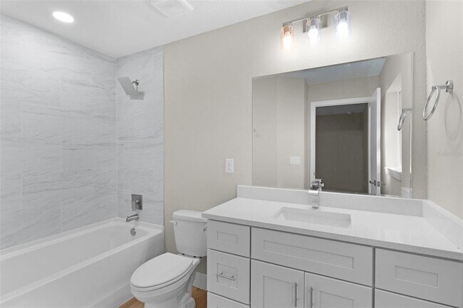 Building Photo - 9170 N Travis Dr