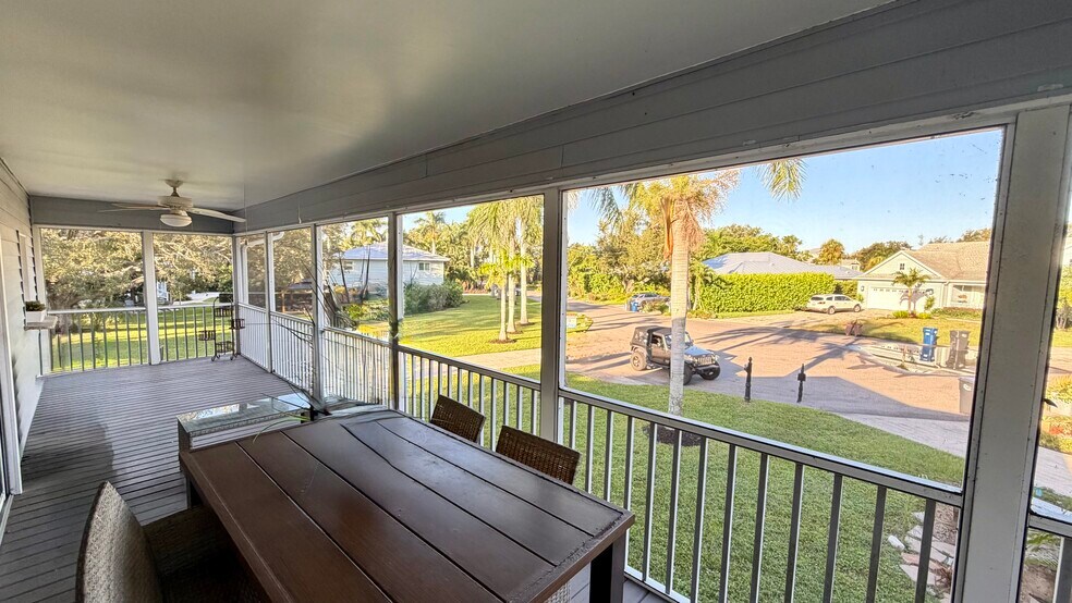 An office or study with a sliding door, offering easy access to the garden for outdoor enjoyment. - 5203 15th St W