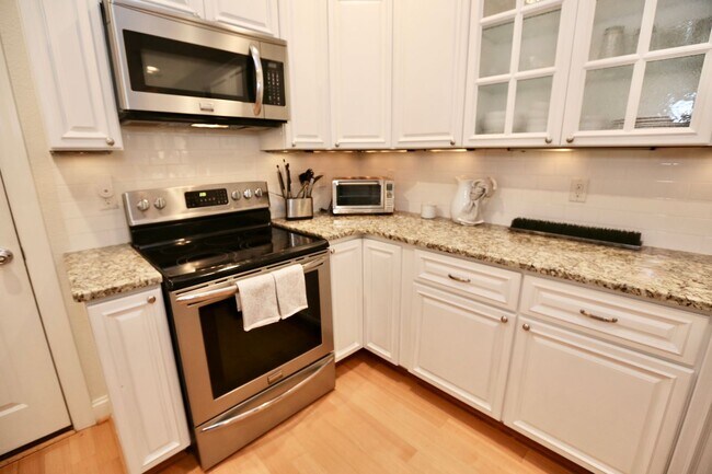 Building Photo - 3-Bedroom Condo 1/2 Mile from Oceanfront! Stainless Steel Appliances - Granite Counter Tops - All...
