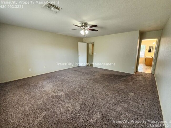 Building Photo - Large 4 bedroom 2.5 bathrooms 3 car Garage...