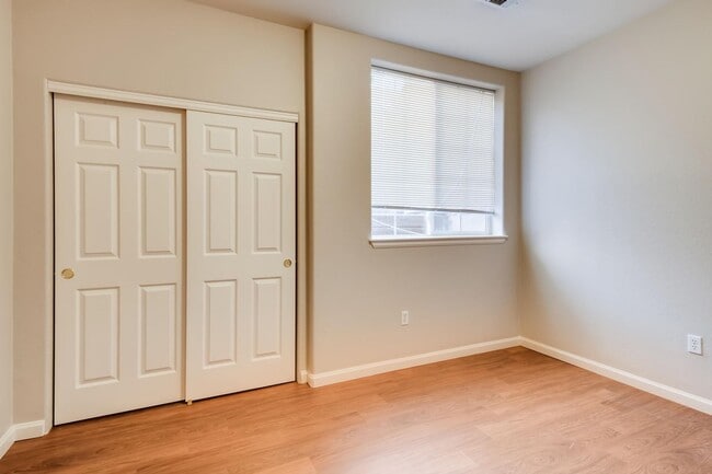 Building Photo - Stunning 3-bed 3-bath townhome that features hardwood floors and an attached 2-car garage!