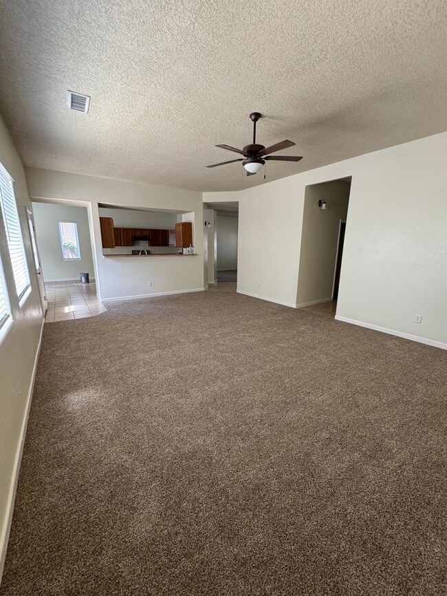Building Photo - Spacious 2-Story Home with 3-Car Garage in...