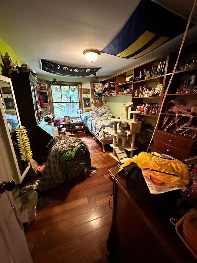 Building Photo - Dream Home in Highland, Michigan: Your Private Oasis on 5 Wooded Acres