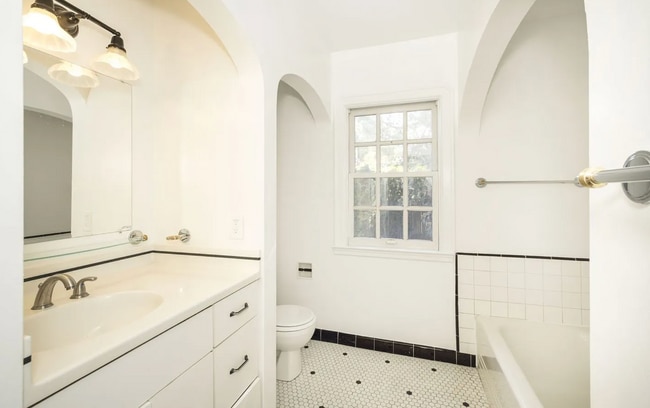 Building Photo - Charming Spanish Style Cottage with Incredible Deck- Gardener's Delight!