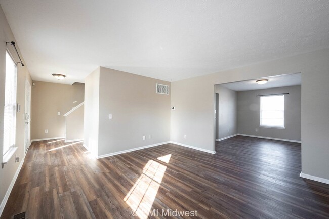 Building Photo - "Spacious 4-Bedroom Gem with Finished Base...