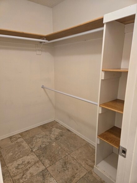 Primary bedroom closet - 573 Serenade Cir E