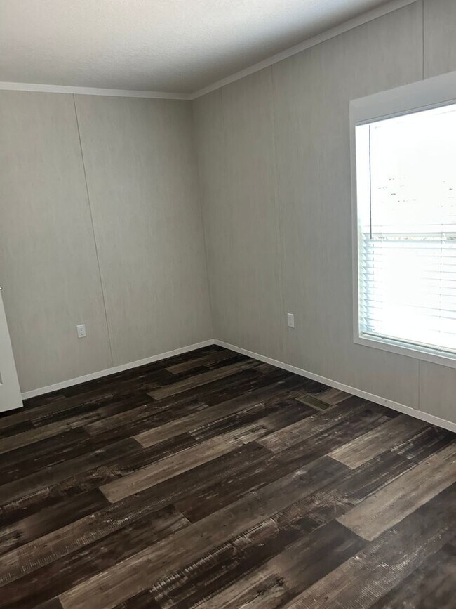 Building Photo - SPECTACULAR WATER-VIEW W/ LARGE DECK NEWER  MOBILE HOME
