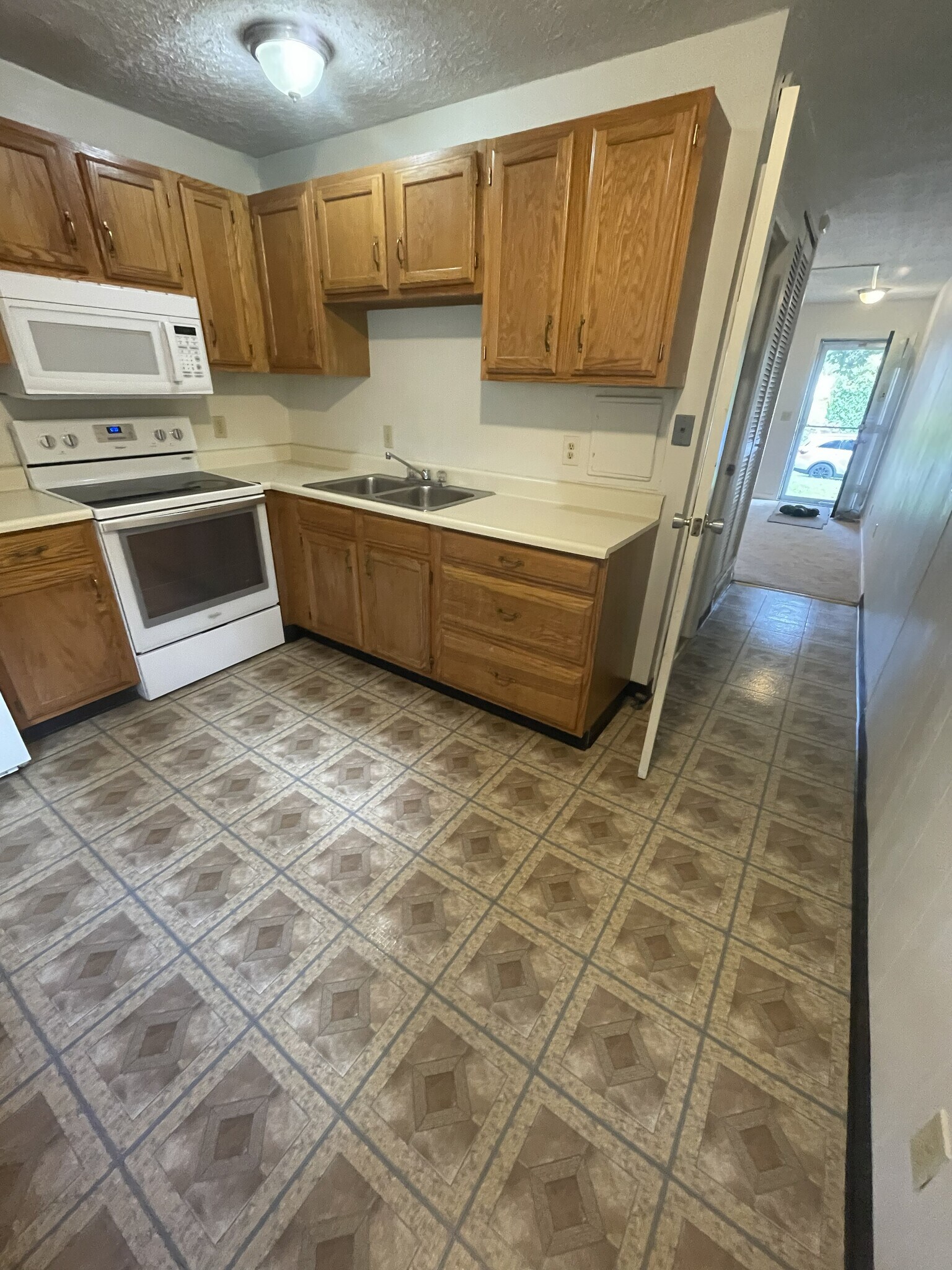 Kitchen looking down Hall - 326D Cortland St
