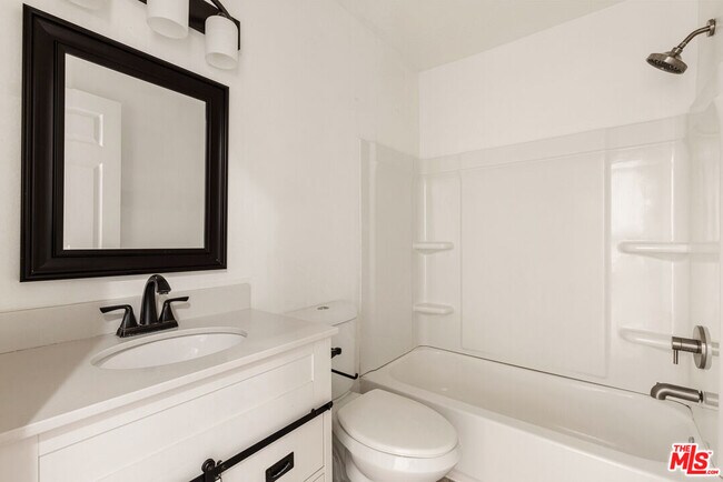 Building Photo - 1836 E Ave J2