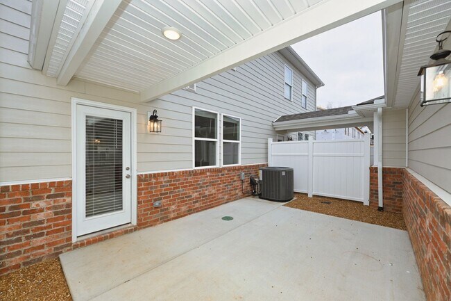 Building Photo - **BE THE LUCKY ONE TO LIVE IN THIS 2024-BUILT BRICK TOWNHOME IN THE VILLAS AT REGAL SQUARE FEATUR...