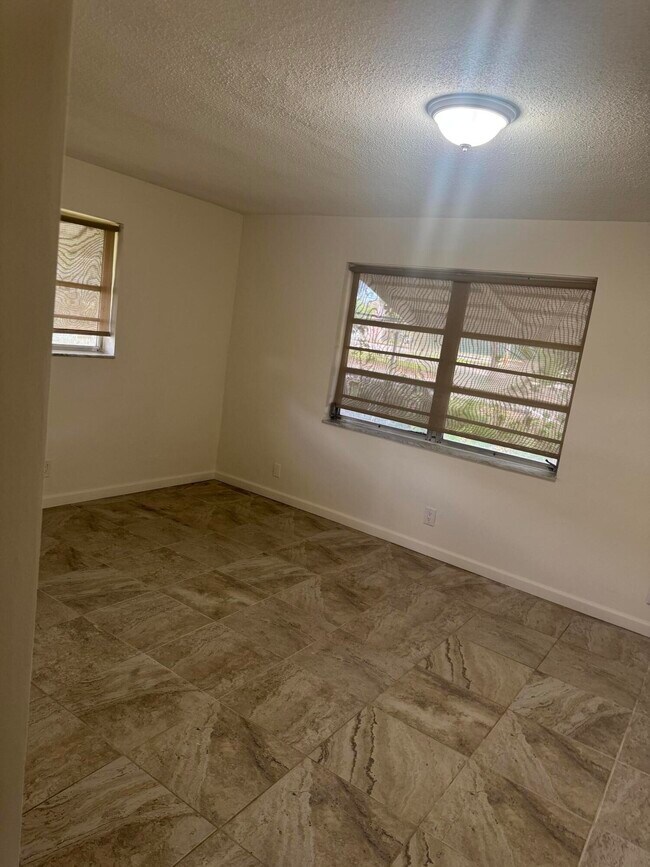 Building Photo - 100 NW 27th St