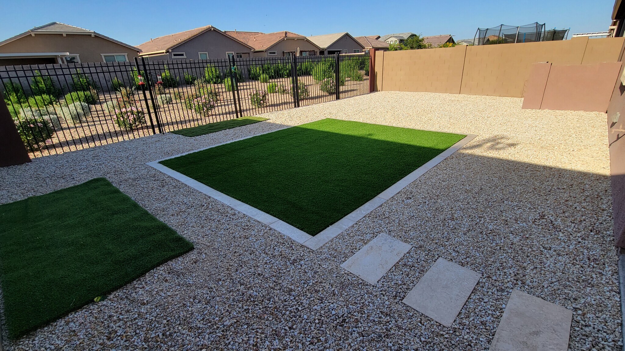 Open-Fence Backyard with Turf, Travertine, Green Belt Landscape - 9530 E Tesla Ave