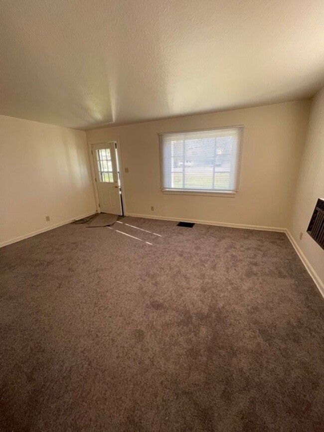 Building Photo - Available NOW! Darling 2 Bedroom Ranch