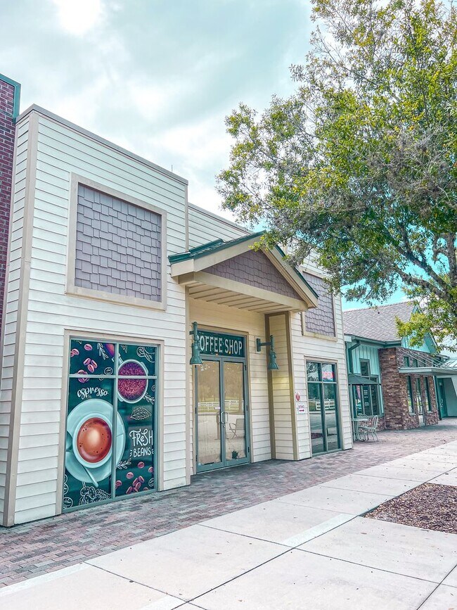 Building Photo - Spacious 4-Bedroom Townhome in Harmony – A Perfect Blend of Nature & Comfort!