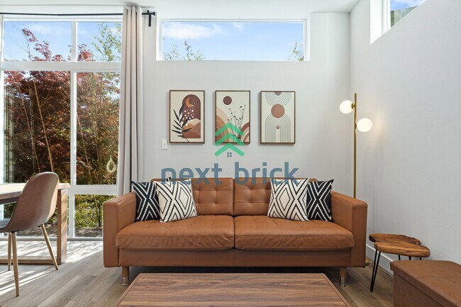 Building Photo - Offer: Unfurnished option available at $3,250, with an optional furnished package for an addition...