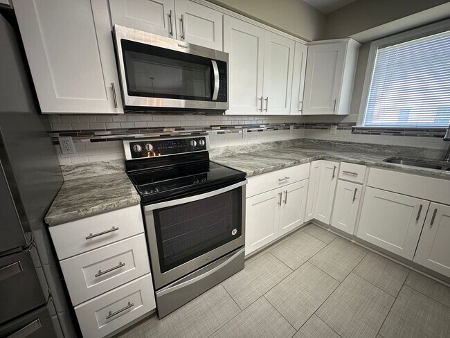 Building Photo - Call Amanda Tate at (757)289-6810 for more information
