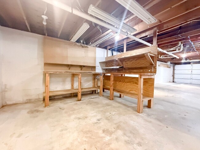 Building Photo - Spacious 3-Bedroom Home with Screened Porch, 2-Car Garage + Workshop