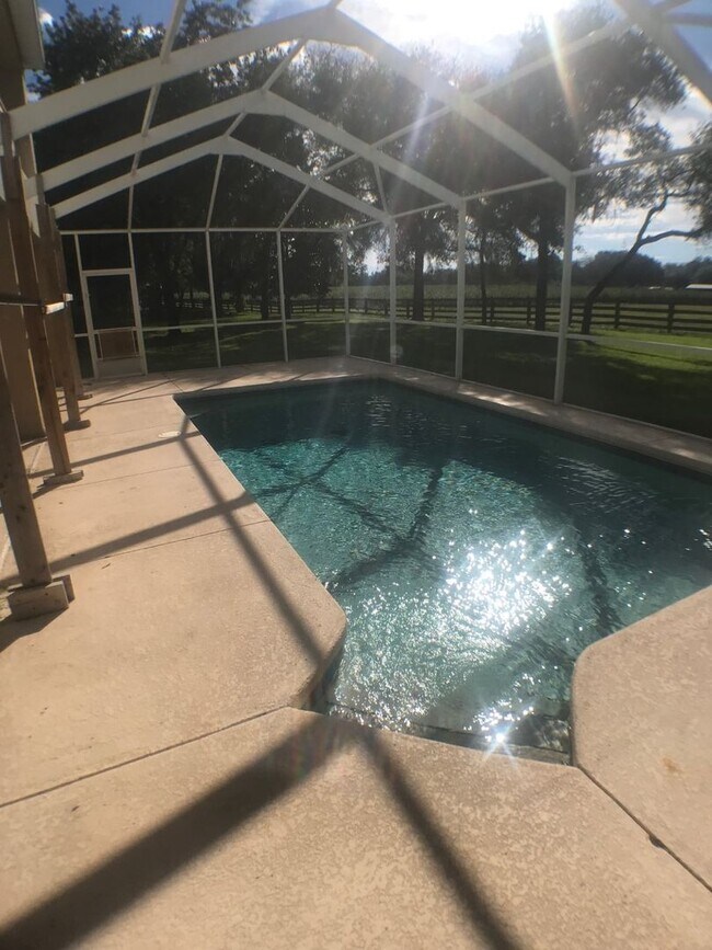 Building Photo - Great 4 bedroom pool home in gated community