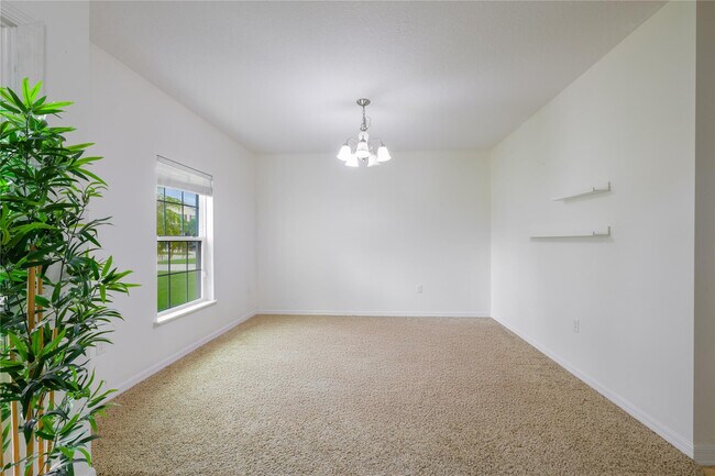 Building Photo - 6147 NW Butterfly Orchid Pl