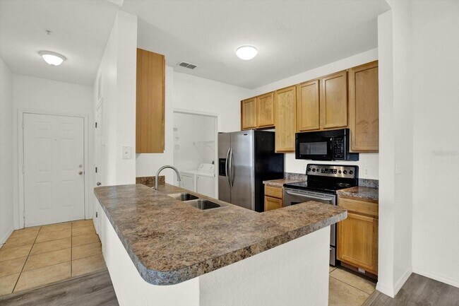 Building Photo - 10201 Courtney Palms Blvd