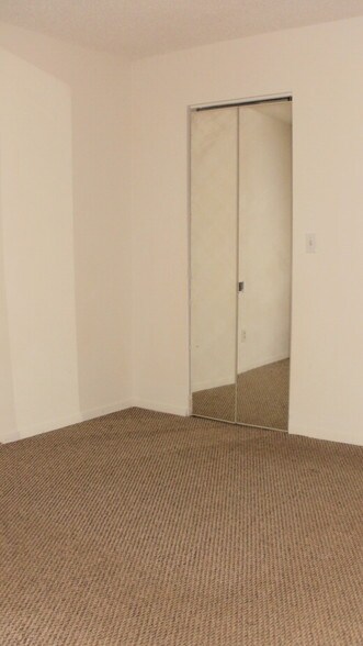 Bedroom w/Walk-in Closet - 10150 E Virginia Ave