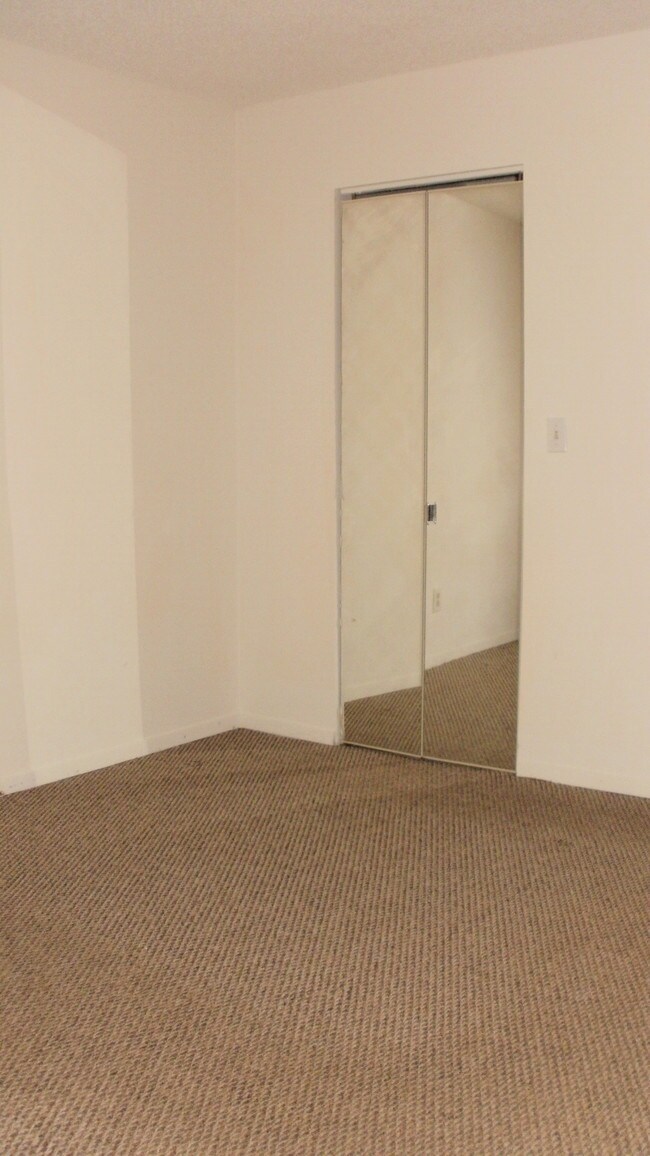 Bedroom w/Walk-in Closet - 10150 E Virginia Ave