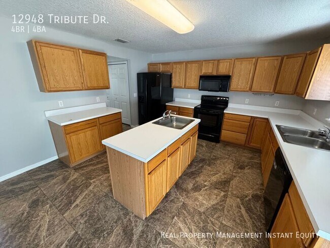 Building Photo - 12948 Tribute Dr