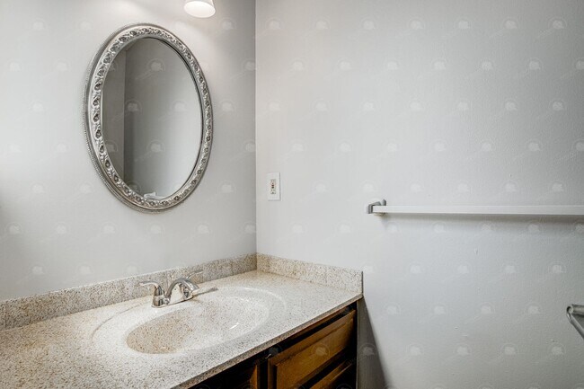 Building Photo - **Spacious 3-Bedroom Townhome with Partially Finished Basement and Off-Street Parking**