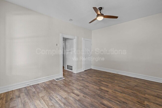 Building Photo - 3402 Dunnica Ave