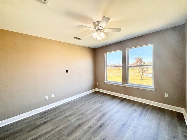 Building Photo - Stunning 5-Bedroom Home with Breathtaking Lake & Golf Course Views – Pelican Point Subdivision