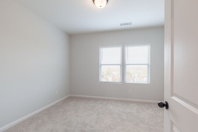 Building Photo - Recently Built 3/3.5 Townhome w/ City Views and Two Car Garage