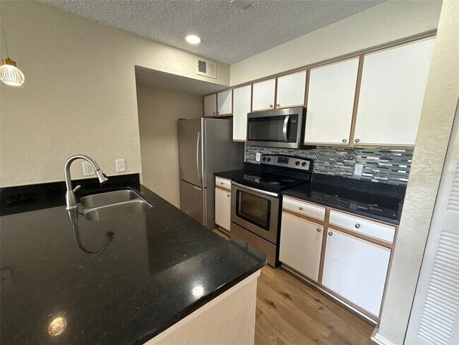 Building Photo - 2212 Grand Cayman Ct