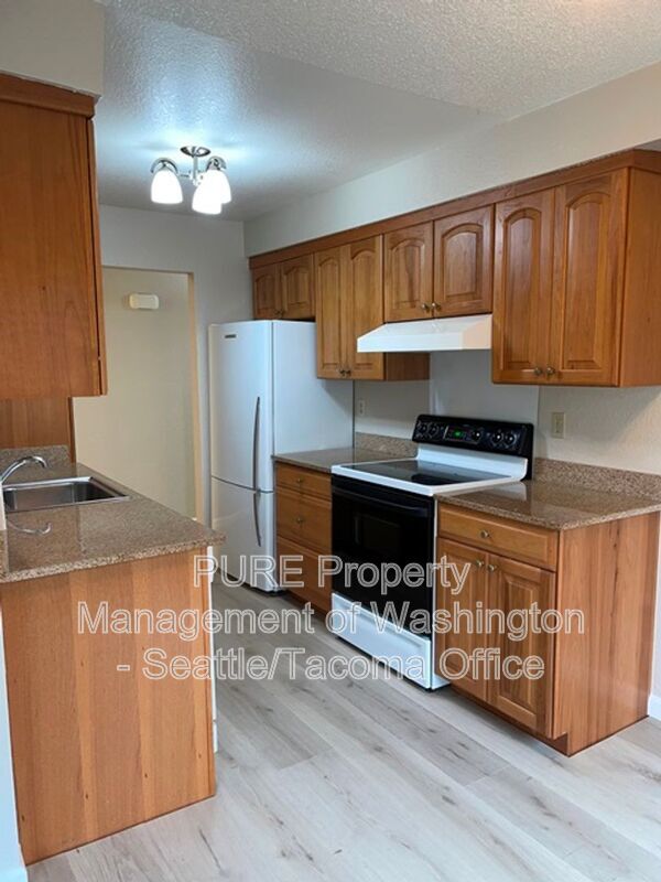 Building Photo - 8626 26th Ave SW