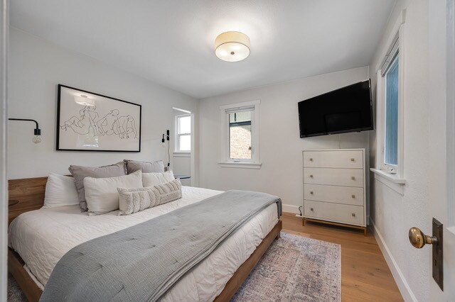 Primary bedroom (first floor) - pictured is a king size bed - 1131 S Elizabeth St