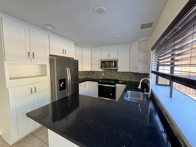 Building Photo - 4 Bedroom - 2 Bathroom with view