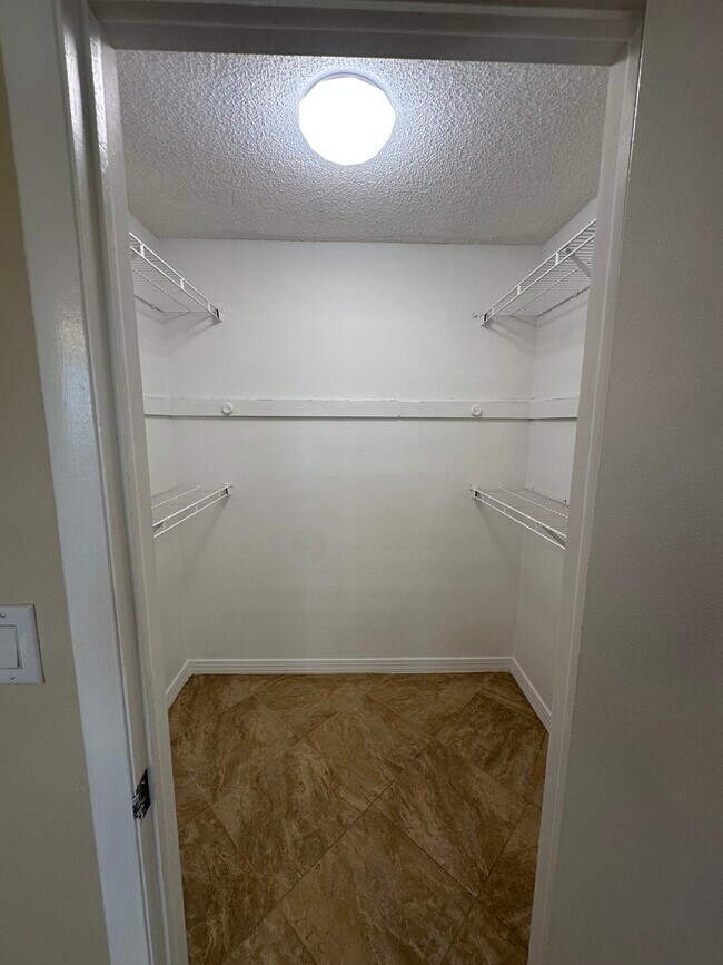 Building Photo - Poinciana Condominiums