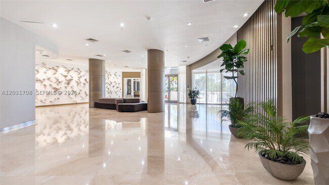 Building Photo - 10275 Collins Ave