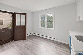 Building Photo - Discover this beautifully updated Cape Cod...