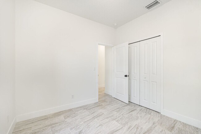 Building Photo - BRAND NEW! 4/2 PALM BAY!