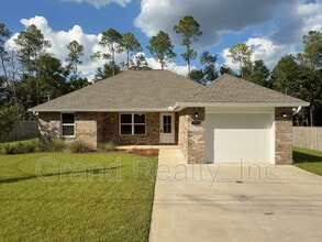 Building Photo - 6902 Trailride N