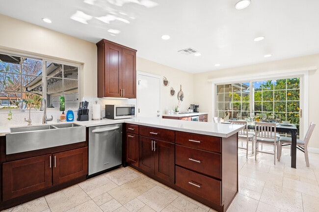 Building Photo - Luxury Estate with Sparkling Pool & Elegant Amenities