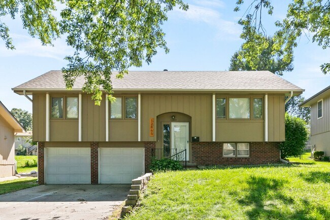 Primary Photo - Stylish 3-Bed, 2-Bath Renovated Home with Granite Counters, 2-Car Garage & Large Fenced Yard in O...