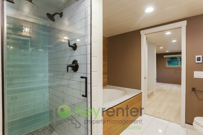 Building Photo - Modern 2-Bedroom Gem with Garage, Shed, an...