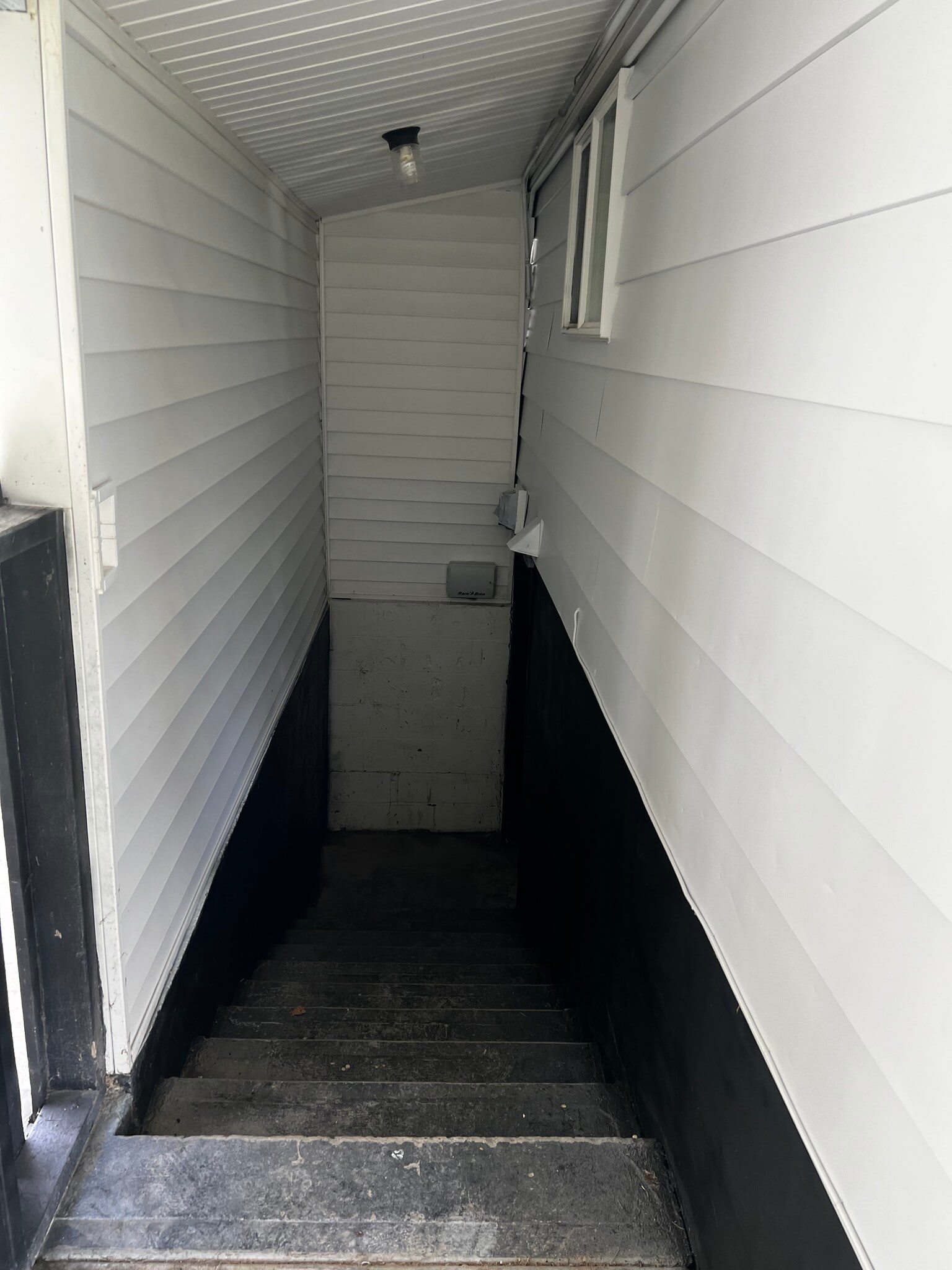 Entry to basement/3rd bedroom - 219 E Montezuma Ave