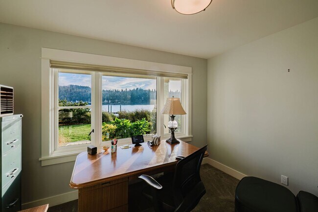 Building Photo - Impeccable Low Bank Bainbridge Waterfront Home with Private Dock